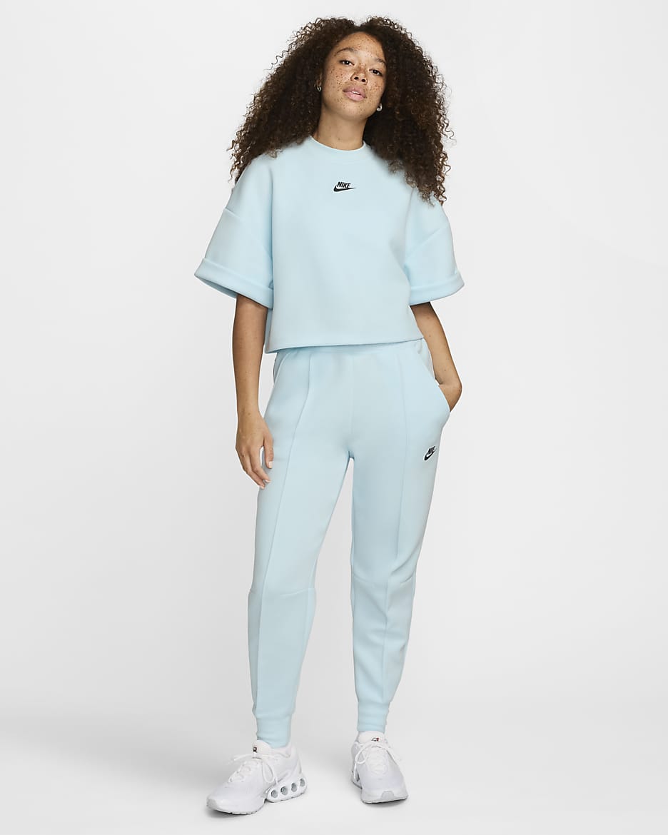 Nike store tech top